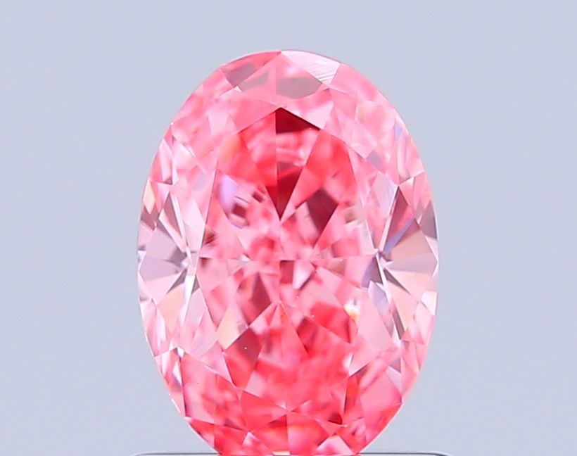 Loose Diamond - OVAL 1.09ct Fancy Vivid Pink VVS2: Loose Diamond - OVAL 1.09ct Fancy Vivid Pink VVS2 Source: This is a real non-mined Diamond that has been grown in a lab Shape: OVAL Carats: 1.09 Color: Fancy Vivid Pink Certification: IGI Video: