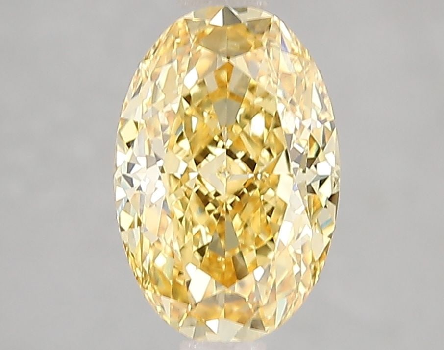 Loose Diamond - OVAL 2.09ct Fancy Vivid Yellow VVS2: Loose Diamond - OVAL 2.09ct Fancy Vivid Yellow VVS2 Source: This is a real non-mined Diamond that has been grown in a lab Shape: OVAL Carats: 2.09 Color: Fancy Vivid Yellow Certification: IGI Video: