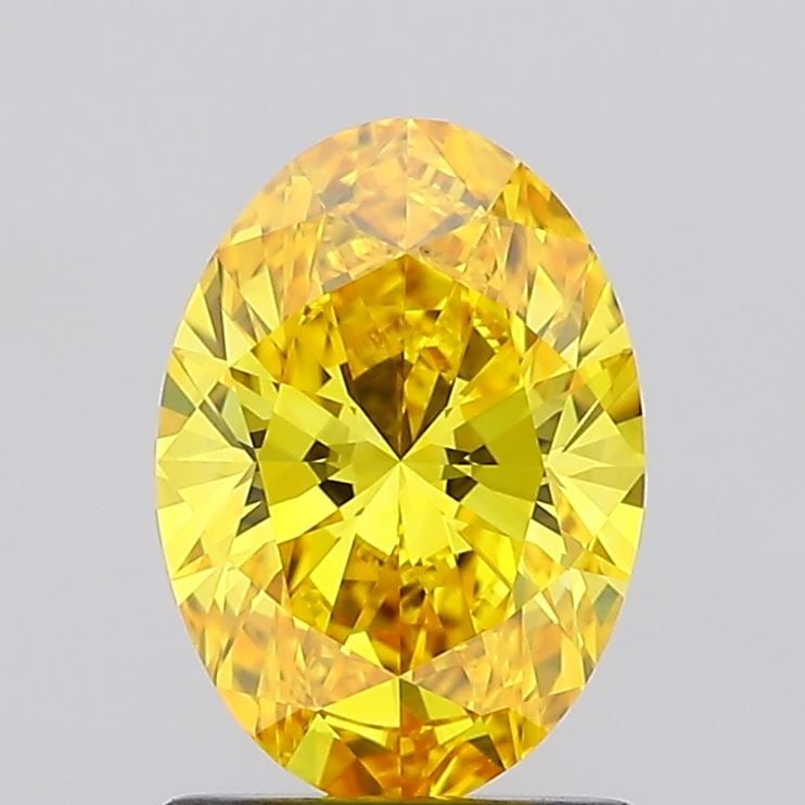 Loose Diamond - OVAL 1.23ct Fancy Vivid Yellow VS1: Loose Diamond - OVAL 1.23ct Fancy Vivid Yellow VS1 Source: This is a real non-mined Diamond that has been grown in a lab Shape: OVAL Carats: 1.23 Color: Fancy Vivid Yellow Certification: IGI Video: