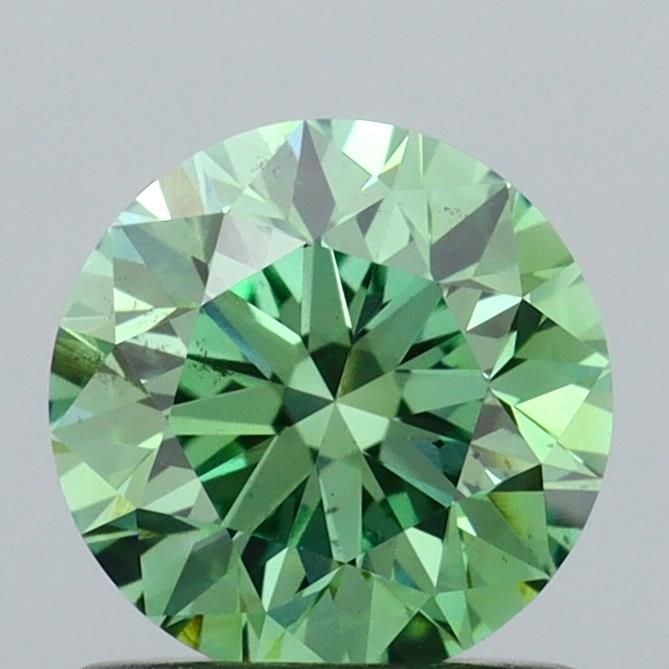 Loose Diamond - ROUND 0.96ct Fancy Vivid Green SI1: Loose Diamond - ROUND 0.96ct Fancy Vivid Green SI1 Source: This is a real non-mined Diamond that has been grown in a lab Shape: ROUND Carats: 0.96 Color: Fancy Vivid Green Certification: IGI Video: