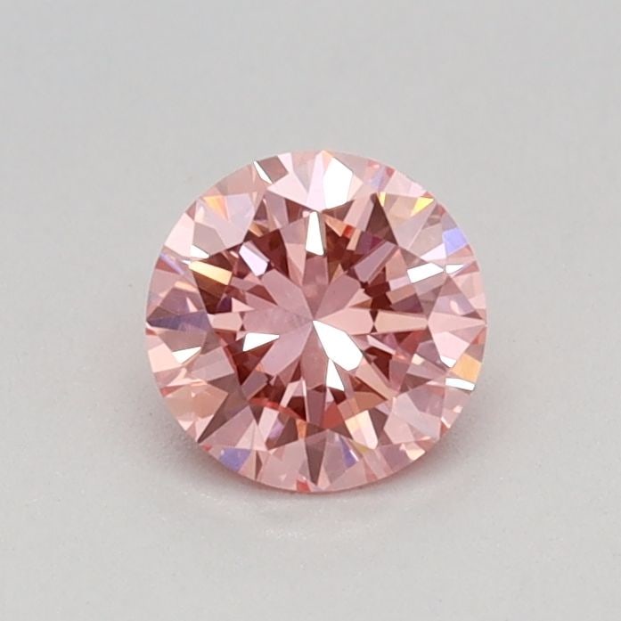 Loose Diamond - ROUND 0.35ct Fancy Vivid Pink VVS2: Loose Diamond - ROUND 0.35ct Fancy Vivid Pink VVS2 Source: This is a real non-mined Diamond that has been grown in a lab Shape: ROUND Carats: 0.35 Color: Fancy Vivid Pink Certification: IGI Video: