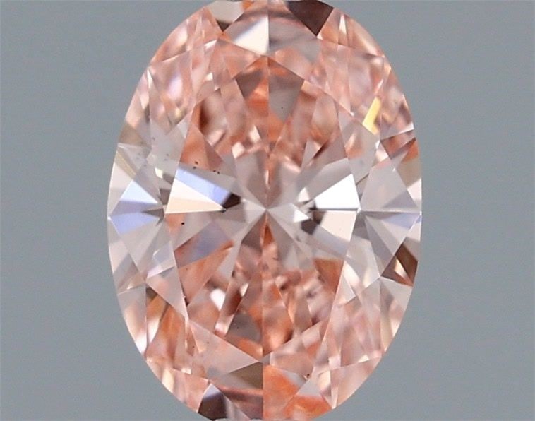 Loose Diamond - OVAL 0.47ct Fancy Vivid Pink VS1: Loose Diamond - OVAL 0.47ct Fancy Vivid Pink VS1 Source: This is a real non-mined Diamond that has been grown in a lab Shape: OVAL Carats: 0.47 Color: Fancy Vivid Pink Certification: IGI Video: