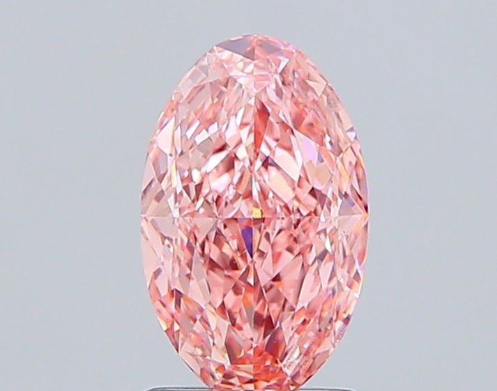 Loose Diamond - OVAL 1.55ct Fancy Vivid Pink VS1: Loose Diamond - OVAL 1.55ct Fancy Vivid Pink VS1 Source: This is a real non-mined Diamond that has been grown in a lab Shape: OVAL Carats: 1.55 Color: Fancy Vivid Pink Certification: IGI Video: