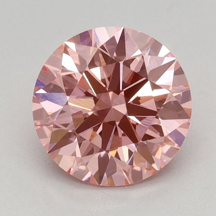 Ideal Loose Diamond - ROUND 0.95ct Fancy Vivid Pink VVS2: Ideal Loose Diamond - ROUND 0.95ct Fancy Vivid Pink VVS2 Source: This is a real non-mined Diamond that has been grown in a lab Shape: ROUND Carats: 0.95 Color: Fancy Vivid Pink Certification: IGI