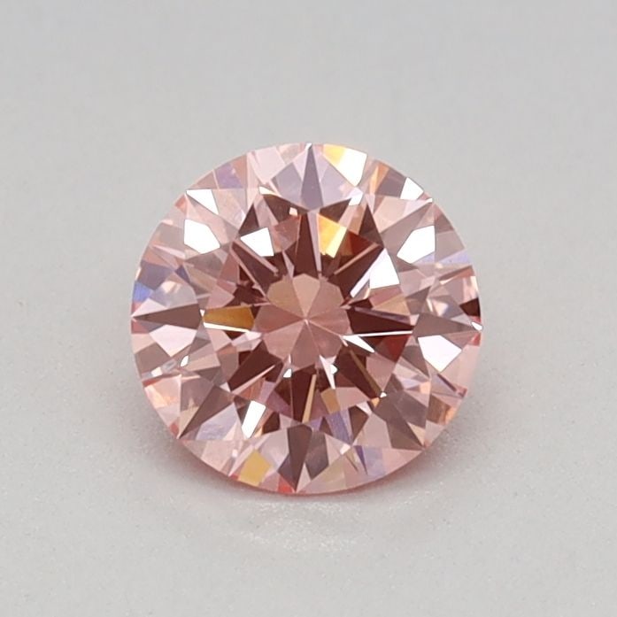 Loose Diamond - ROUND 0.36ct Fancy Vivid Pink VVS2: Loose Diamond - ROUND 0.36ct Fancy Vivid Pink VVS2 Source: This is a real non-mined Diamond that has been grown in a lab Shape: ROUND Carats: 0.36 Color: Fancy Vivid Pink Certification: IGI Video: