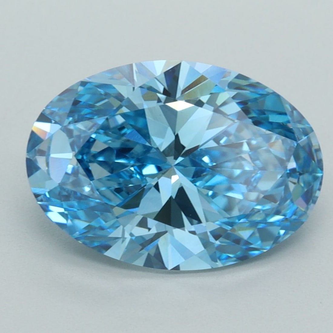 Loose Diamond - OVAL 5.07ct Fancy Vivid Blue VVS2: Loose Diamond - OVAL 5.07ct Fancy Vivid Blue VVS2 Source: This is a real non-mined Diamond that has been grown in a lab Shape: OVAL Carats: 5.07 Color: Fancy Vivid Blue Certification: IGI Video: