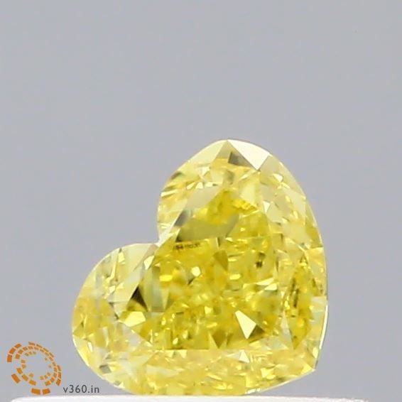 Loose Diamond - HEART 0.32ct Fancy Vivid Yellow VVS2: Loose Diamond - HEART 0.32ct Fancy Vivid Yellow VVS2 Source: This is a real non-mined Diamond that has been grown in a lab Shape: HEART Carats: 0.32 Color: Fancy Vivid Yellow Certification: IGI Video: