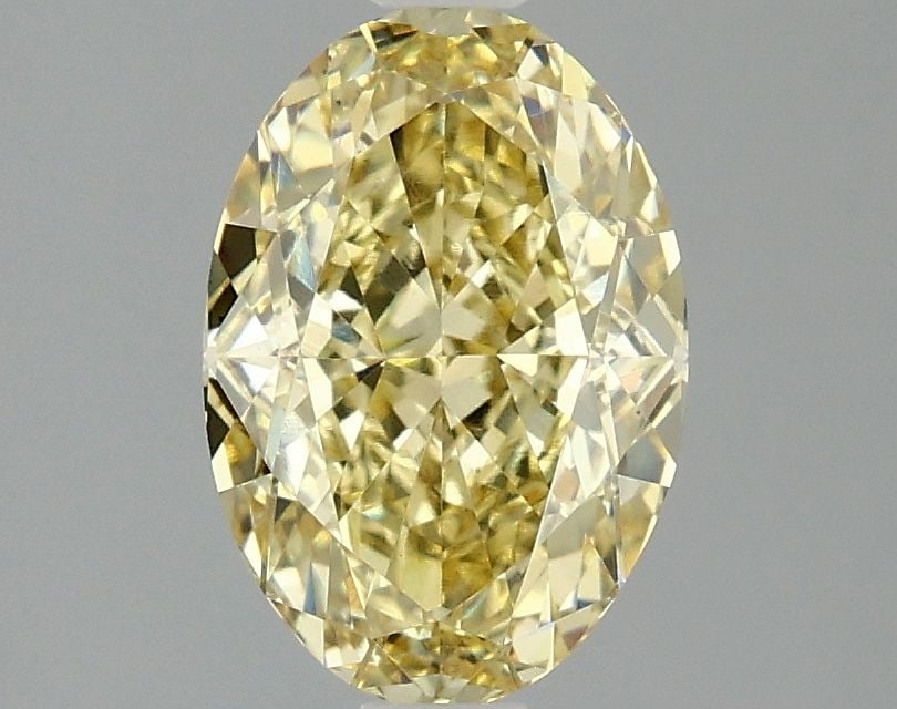 Loose Diamond - OVAL 2.1ct Fancy Intense Yellow VS1: Loose Diamond - OVAL 2.1ct Fancy Intense Yellow VS1 Source: This is a real non-mined Diamond that has been grown in a lab Shape: OVAL Carats: 2.1 Color: Fancy Intense Yellow Certification: IGI Video: