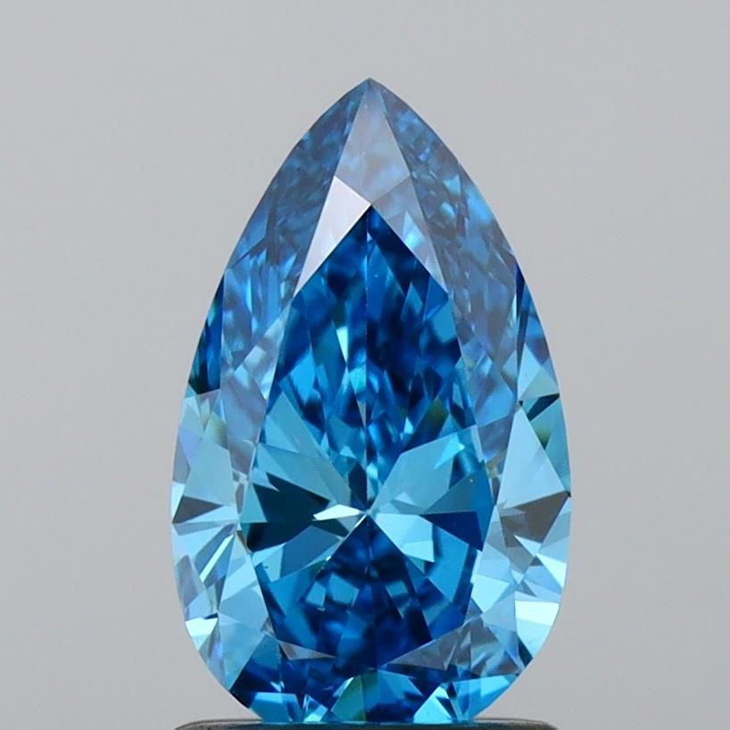 Loose Diamond - PEAR 1.2ct Fancy Vivid Blue VS1: Loose Diamond - PEAR 1.2ct Fancy Vivid Blue VS1 Source: This is a real non-mined Diamond that has been grown in a lab Shape: PEAR Carats: 1.2 Color: Fancy Vivid Blue Certification: IGI Video: Video