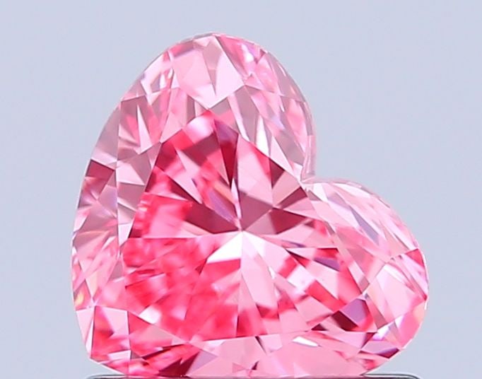 Loose Diamond - HEART 0.82ct Fancy Vivid Pink VVS2: Loose Diamond - HEART 0.82ct Fancy Vivid Pink VVS2 Source: This is a real non-mined Diamond that has been grown in a lab Shape: HEART Carats: 0.82 Color: Fancy Vivid Pink Certification: IGI Video: