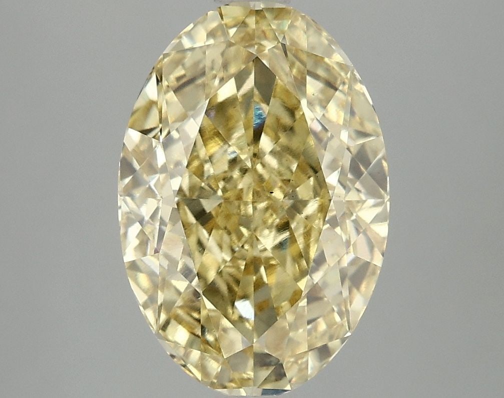 Loose Diamond - OVAL 4.03ct Fancy Vivid Yellow VS1: Loose Diamond - OVAL 4.03ct Fancy Vivid Yellow VS1 Source: This is a real non-mined Diamond that has been grown in a lab Shape: OVAL Carats: 4.03 Color: Fancy Vivid Yellow Certification: IGI Video: