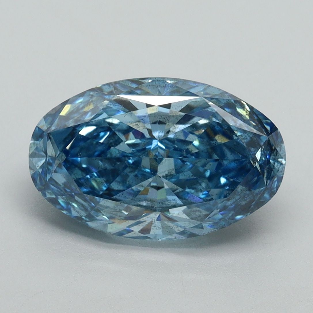 Loose Diamond - OVAL 3.03ct Fancy Vivid Blue SI2: Loose Diamond - OVAL 3.03ct Fancy Vivid Blue SI2 Source: This is a real non-mined Diamond that has been grown in a lab Shape: OVAL Carats: 3.03 Color: Fancy Vivid Blue Certification: IGI Video: