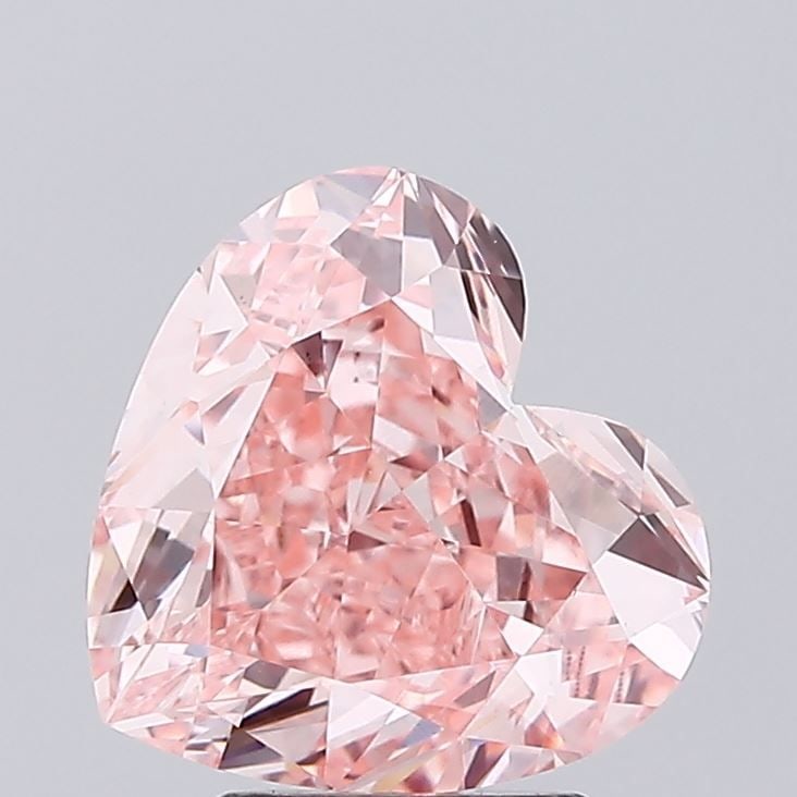 Loose Diamond - HEART 3.2ct Fancy Vivid Pink VS1: Loose Diamond - HEART 3.2ct Fancy Vivid Pink VS1 Source: This is a real non-mined Diamond that has been grown in a lab Shape: HEART Carats: 3.2 Color: Fancy Vivid Pink Certification: IGI Video: