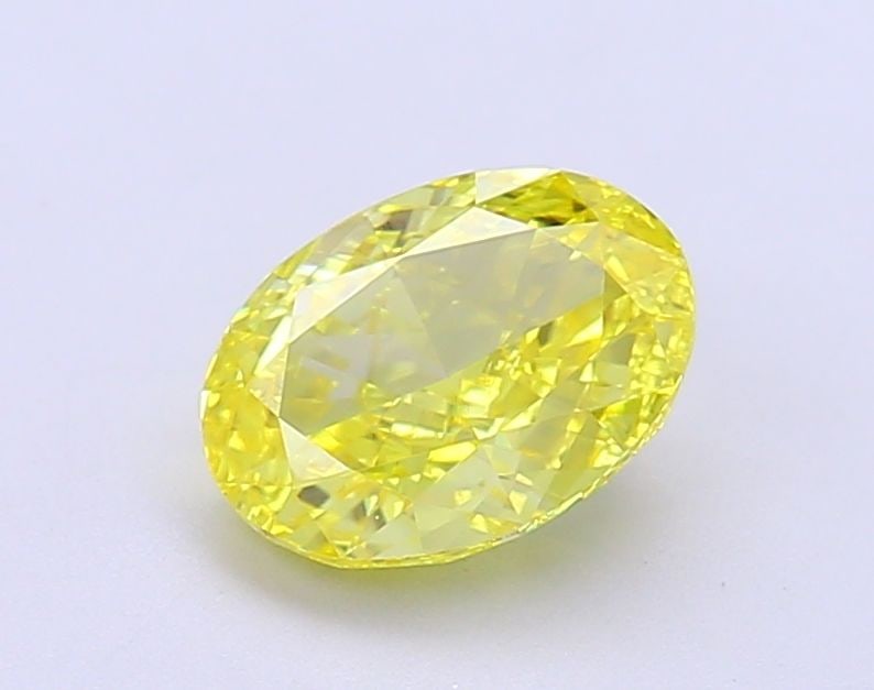 Loose Diamond - OVAL 1.53ct Fancy Vivid Yellow VS1: Loose Diamond - OVAL 1.53ct Fancy Vivid Yellow VS1 Source: This is a real non-mined Diamond that has been grown in a lab Shape: OVAL Carats: 1.53 Color: Fancy Vivid Yellow Certification: IGI Video: