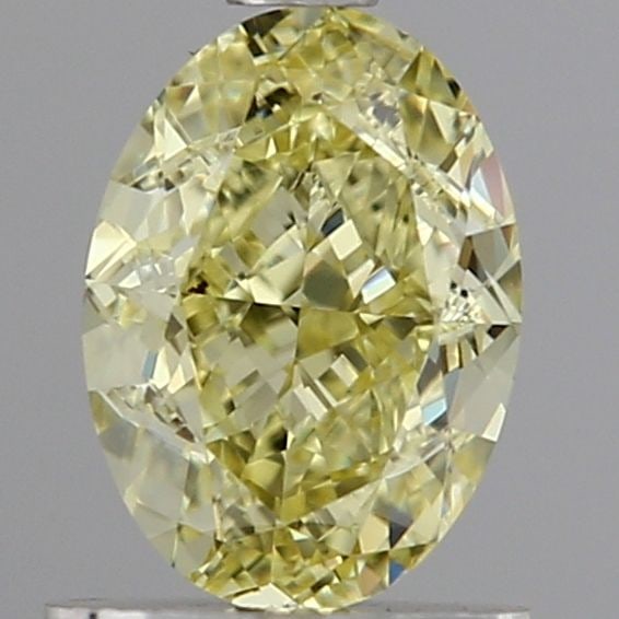 Loose Diamond - OVAL 1.1ct Fancy Yellow VVS2: Loose Diamond - OVAL 1.1ct Fancy Yellow VVS2 Source: This is a real non-mined Diamond that has been grown in a lab Shape: OVAL Carats: 1.1 Color: Fancy Yellow Certification: IGI Video: