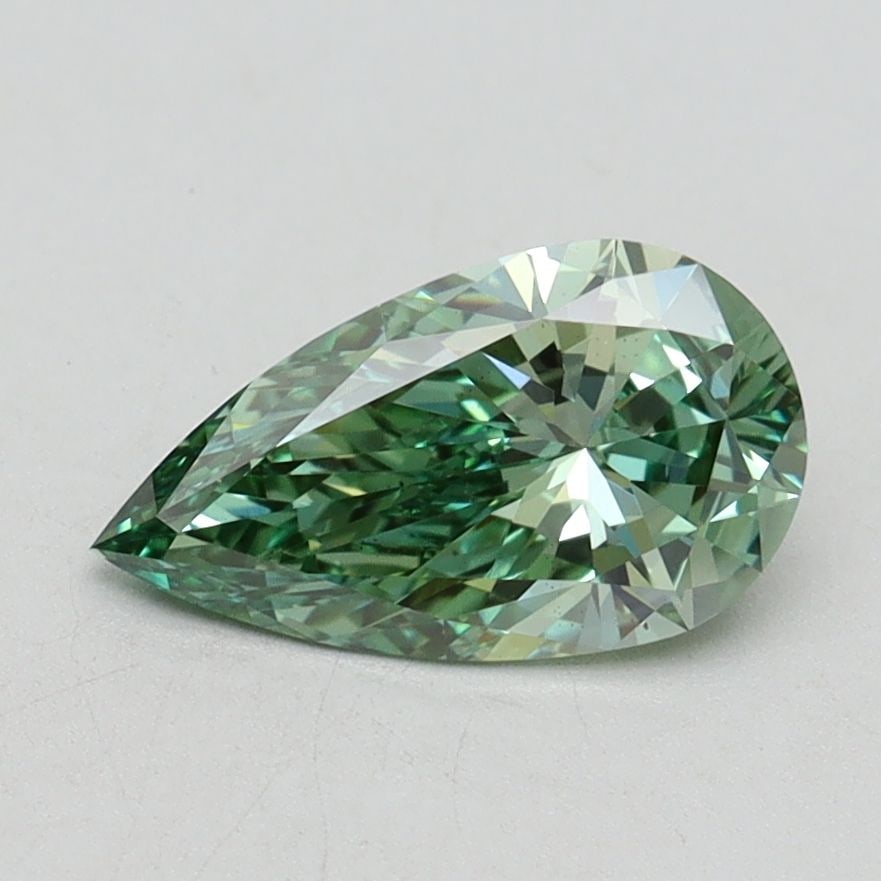 Loose Diamond - PEAR 1.01ct Fancy Vivid Green VS2: Loose Diamond - PEAR 1.01ct Fancy Vivid Green VS2 Source: This is a real non-mined Diamond that has been grown in a lab Shape: PEAR Carats: 1.01 Color: Fancy Vivid Green Certification: IGI Video:
