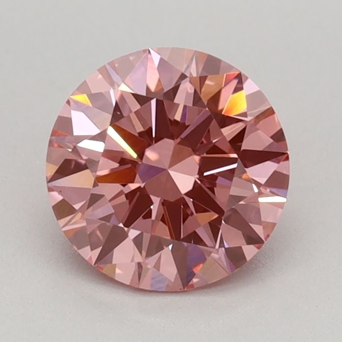 Loose Diamond - ROUND 0.77ct Fancy Vivid Pink VS1: Loose Diamond - ROUND 0.77ct Fancy Vivid Pink VS1 Source: This is a real non-mined Diamond that has been grown in a lab Shape: ROUND Carats: 0.77 Color: Fancy Vivid Pink Certification: IGI Video: