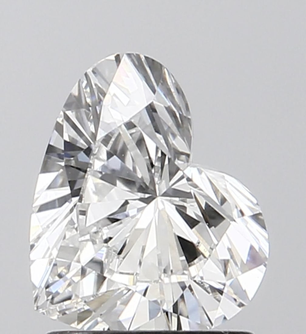 Loose Diamond - HEART 1.02ct E VVS2: Loose Diamond - HEART 1.02ct E VVS2 Source: This is a real non-mined Diamond that has been grown in a lab Shape: HEART Carats: 1.02 Color: E Clarity: VVS2 Certification: IGI Video: Video Link 