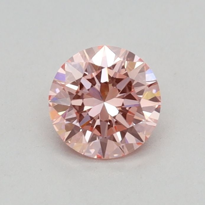Loose Diamond - ROUND 0.34ct Fancy Vivid Pink VVS2: Loose Diamond - ROUND 0.34ct Fancy Vivid Pink VVS2 Source: This is a real non-mined Diamond that has been grown in a lab Shape: ROUND Carats: 0.34 Color: Fancy Vivid Pink Certification: IGI Video: