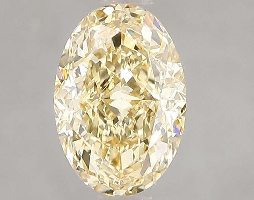 Loose Diamond - OVAL 2.01ct Fancy Intense Yellow VVS2: Loose Diamond - OVAL 2.01ct Fancy Intense Yellow VVS2 Source: This is a real non-mined Diamond that has been grown in a lab Shape: OVAL Carats: 2.01 Color: Fancy Intense Yellow Certification: IGI