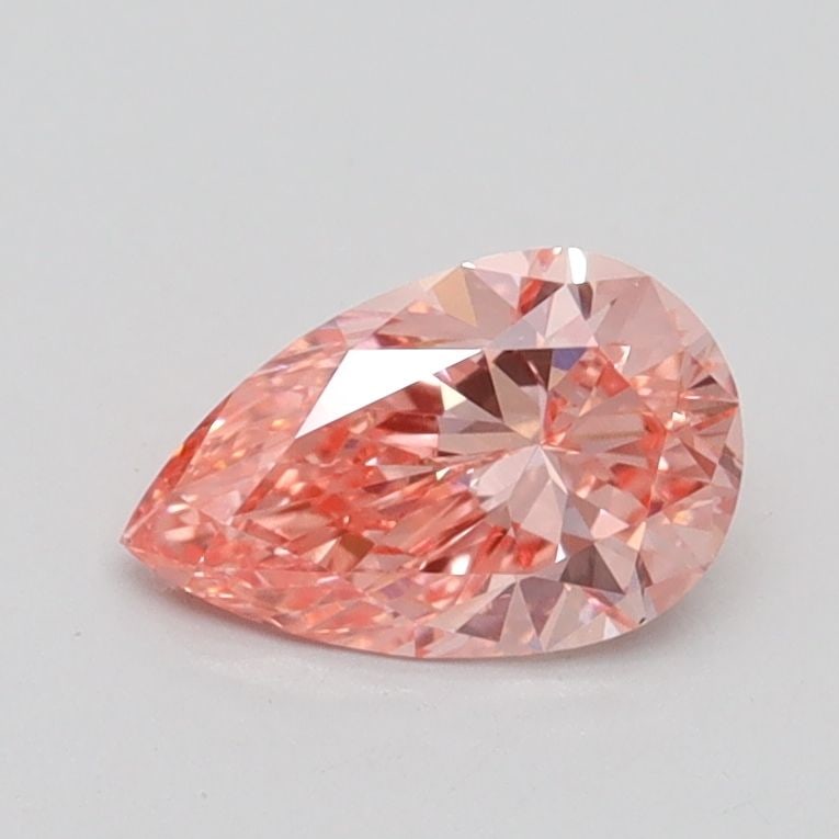 Loose Diamond - PEAR 0.7ct Fancy Vivid Pink VS1: Loose Diamond - PEAR 0.7ct Fancy Vivid Pink VS1 Source: This is a real non-mined Diamond that has been grown in a lab Shape: PEAR Carats: 0.7 Color: Fancy Vivid Pink Certification: IGI Video: Video