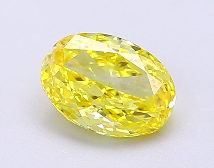 Loose Diamond - OVAL 1.01ct Fancy Vivid Yellow VVS2: Loose Diamond - OVAL 1.01ct Fancy Vivid Yellow VVS2 Source: This is a real non-mined Diamond that has been grown in a lab Shape: OVAL Carats: 1.01 Color: Fancy Vivid Yellow Certification: IGI Video: