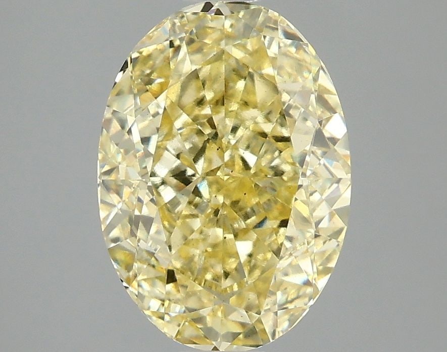 Loose Diamond - OVAL 3.08ct Fancy Intense Yellow VS2: Loose Diamond - OVAL 3.08ct Fancy Intense Yellow VS2 Source: This is a real non-mined Diamond that has been grown in a lab Shape: OVAL Carats: 3.08 Color: Fancy Intense Yellow Certification: IGI