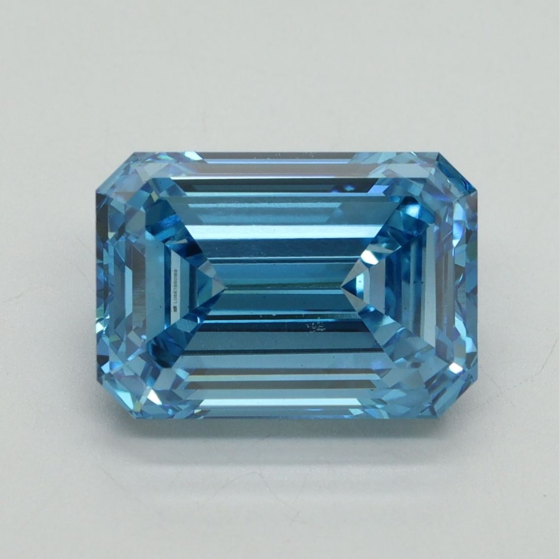 Loose Diamond - EMERALD 5.14ct Fancy Vivid Blue VS1: Loose Diamond - EMERALD 5.14ct Fancy Vivid Blue VS1 Source: This is a real non-mined Diamond that has been grown in a lab Shape: EMERALD Carats: 5.14 Color: Fancy Vivid Blue Certification: IGI