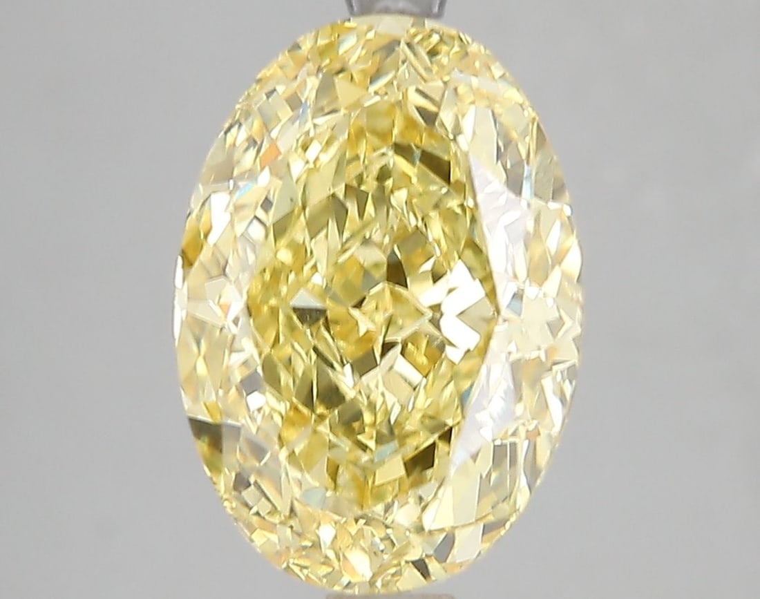 Loose Diamond - OVAL 5.01ct Fancy Vivid Yellow SI1: Loose Diamond - OVAL 5.01ct Fancy Vivid Yellow SI1 Source: This is a real non-mined Diamond that has been grown in a lab Shape: OVAL Carats: 5.01 Color: Fancy Vivid Yellow Certification: IGI Video:
