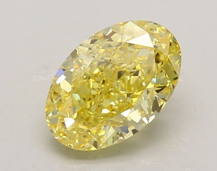Loose Diamond - OVAL 1.23ct Fancy Vivid Yellow VS1: Loose Diamond - OVAL 1.23ct Fancy Vivid Yellow VS1 Source: This is a real non-mined Diamond that has been grown in a lab Shape: OVAL Carats: 1.23 Color: Fancy Vivid Yellow Certification: IGI Video: