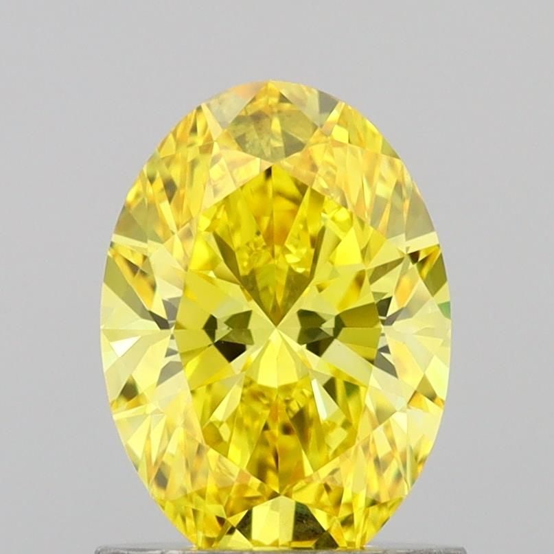 Loose Diamond - OVAL 1.0ct Fancy Vivid Yellow VS1: Loose Diamond - OVAL 1.0ct Fancy Vivid Yellow VS1 Source: This is a real non-mined Diamond that has been grown in a lab Shape: OVAL Carats: 1.0 Color: Fancy Vivid Yellow Certification: IGI Video: