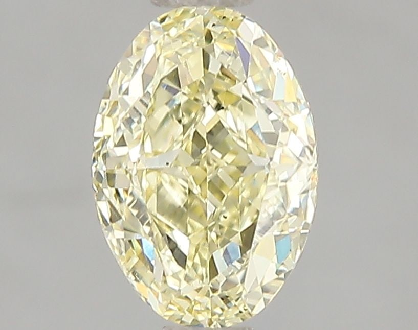 Loose Diamond - OVAL 1.54ct Fancy Yellow VS2: Loose Diamond - OVAL 1.54ct Fancy Yellow VS2 Source: This is a real non-mined Diamond that has been grown in a lab Shape: OVAL Carats: 1.54 Color: Fancy Yellow Certification: IGI Video: