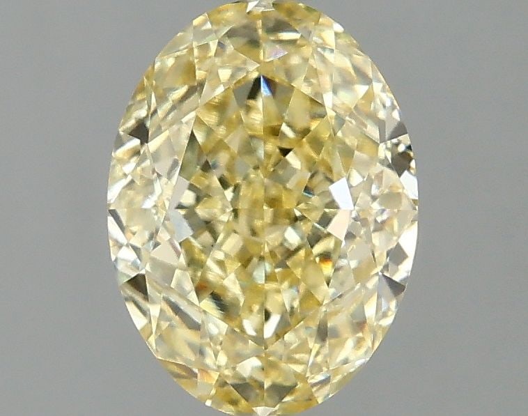 Loose Diamond - OVAL 2.1ct Fancy Intense Yellow VS1: Loose Diamond - OVAL 2.1ct Fancy Intense Yellow VS1 Source: This is a real non-mined Diamond that has been grown in a lab Shape: OVAL Carats: 2.1 Color: Fancy Intense Yellow Certification: IGI