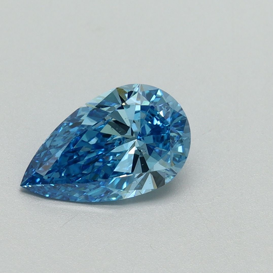 Loose Diamond - PEAR 1.07ct Fancy Vivid Blue VS2: Loose Diamond - PEAR 1.07ct Fancy Vivid Blue VS2 Source: This is a real non-mined Diamond that has been grown in a lab Shape: PEAR Carats: 1.07 Color: Fancy Vivid Blue Certification: IGI Video: