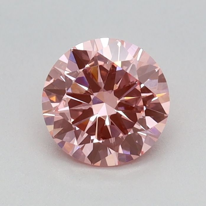 Loose Diamond - ROUND 0.49ct Fancy Vivid Pink VS1: Loose Diamond - ROUND 0.49ct Fancy Vivid Pink VS1 Source: This is a real non-mined Diamond that has been grown in a lab Shape: ROUND Carats: 0.49 Color: Fancy Vivid Pink Certification: IGI Video:
