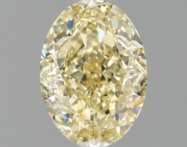 Loose Diamond - OVAL 1.1ct Fancy Yellow VVS2: Loose Diamond - OVAL 1.1ct Fancy Yellow VVS2 Source: This is a real non-mined Diamond that has been grown in a lab Shape: OVAL Carats: 1.1 Color: Fancy Yellow Certification: IGI Video: Video Link 