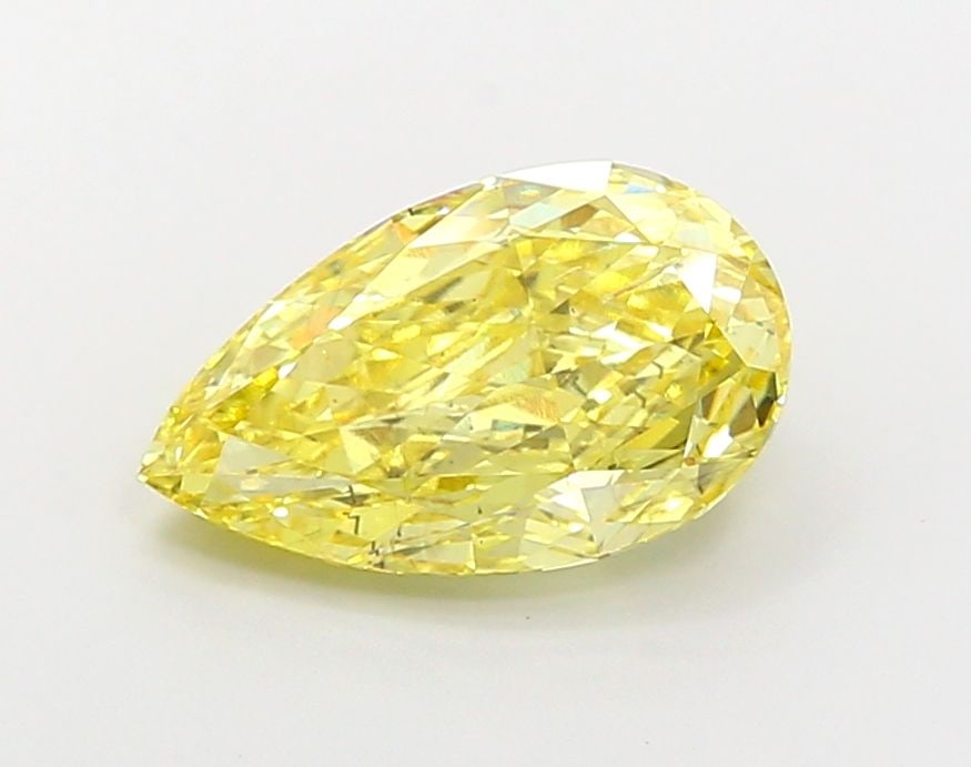 Loose Diamond - PEAR 4.08ct Fancy Vivid Yellow SI1: Loose Diamond - PEAR 4.08ct Fancy Vivid Yellow SI1 Source: This is a real non-mined Diamond that has been grown in a lab Shape: PEAR Carats: 4.08 Color: Fancy Vivid Yellow Certification: IGI Video: