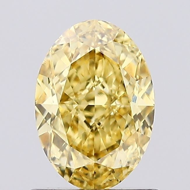 Loose Diamond - OVAL 1.01ct Fancy Vivid Yellow VS1: Loose Diamond - OVAL 1.01ct Fancy Vivid Yellow VS1 Source: This is a real non-mined Diamond that has been grown in a lab Shape: OVAL Carats: 1.01 Color: Fancy Vivid Yellow Certification: IGI Video: