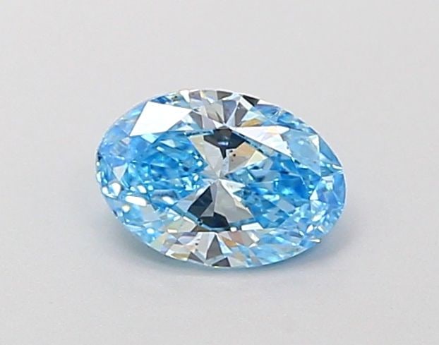 Loose Diamond - OVAL 0.51ct Fancy Vivid Blue VS2: Loose Diamond - OVAL 0.51ct Fancy Vivid Blue VS2 Source: This is a real non-mined Diamond that has been grown in a lab Shape: OVAL Carats: 0.51 Color: Fancy Vivid Blue Certification: IGI Video: