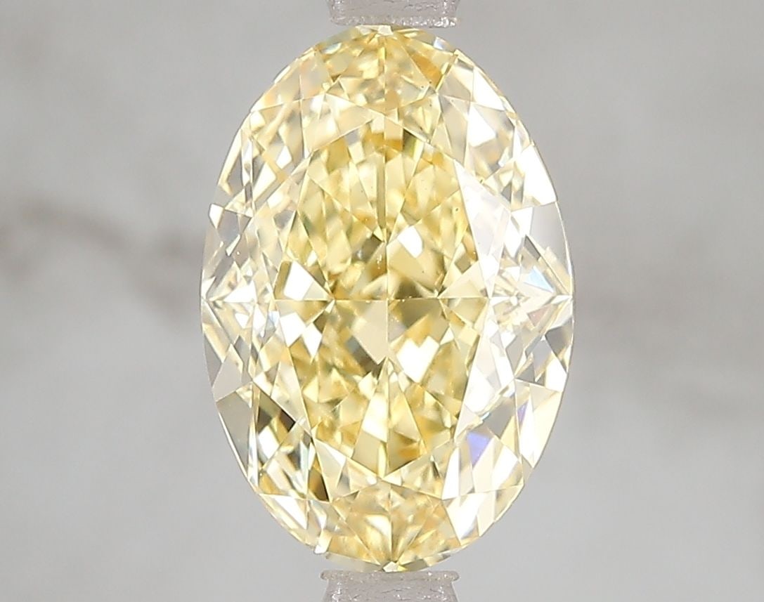 Loose Diamond - OVAL 3.05ct Fancy Vivid Yellow VS1: Loose Diamond - OVAL 3.05ct Fancy Vivid Yellow VS1 Source: This is a real non-mined Diamond that has been grown in a lab Shape: OVAL Carats: 3.05 Color: Fancy Vivid Yellow Certification: IGI Video: