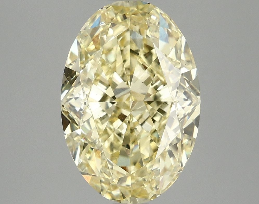 Loose Diamond - OVAL 4.05ct Fancy Vivid Yellow VS2: Loose Diamond - OVAL 4.05ct Fancy Vivid Yellow VS2 Source: This is a real non-mined Diamond that has been grown in a lab Shape: OVAL Carats: 4.05 Color: Fancy Vivid Yellow Certification: IGI Video: