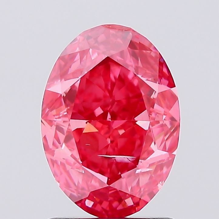 Loose Diamond - OVAL 1.55ct Fancy Vivid Pink SI1: Loose Diamond - OVAL 1.55ct Fancy Vivid Pink SI1 Source: This is a real non-mined Diamond that has been grown in a lab Shape: OVAL Carats: 1.55 Color: Fancy Vivid Pink Certification: IGI Video: