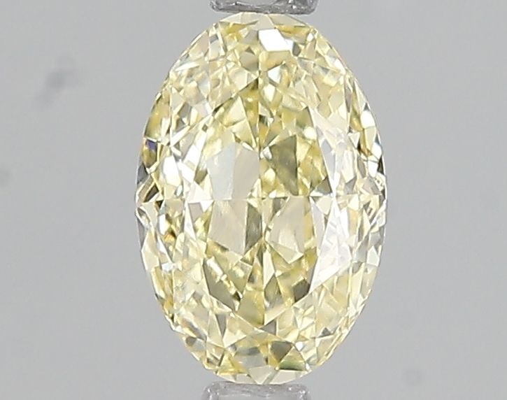 Loose Diamond - OVAL 1.01ct Fancy Yellow VVS2: Loose Diamond - OVAL 1.01ct Fancy Yellow VVS2 Source: This is a real non-mined Diamond that has been grown in a lab Shape: OVAL Carats: 1.01 Color: Fancy Yellow Certification: IGI Video:
