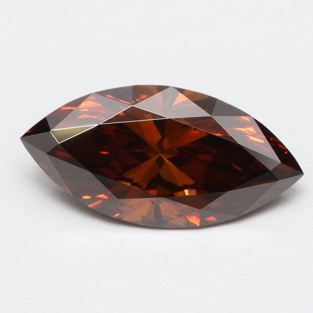 Loose Diamond - MARQUISE 0.71ct Fancy Red VS2: Loose Diamond - MARQUISE 0.71ct Fancy Red VS2 Source: This is a real non-mined Diamond that has been grown in a lab Shape: MARQUISE Carats: 0.71 Color: Fancy Red Certification: NONE Video: Video