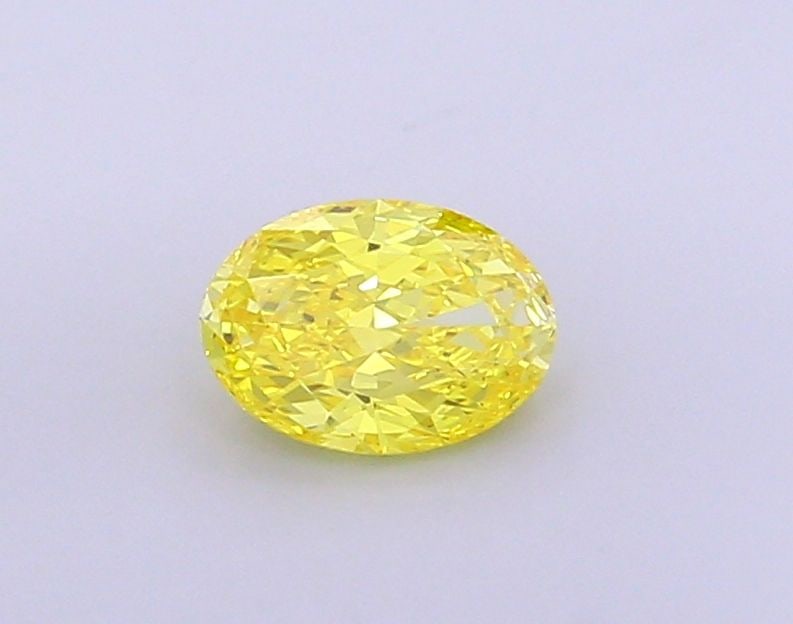 Loose Diamond - OVAL 1.0ct Fancy Vivid Yellow VS1: Loose Diamond - OVAL 1.0ct Fancy Vivid Yellow VS1 Source: This is a real non-mined Diamond that has been grown in a lab Shape: OVAL Carats: 1.0 Color: Fancy Vivid Yellow Certification: IGI Video: