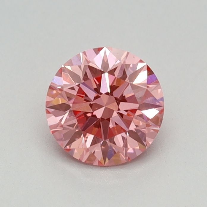 Loose Diamond - ROUND 0.47ct Fancy Vivid Pink VS1: Loose Diamond - ROUND 0.47ct Fancy Vivid Pink VS1 Source: This is a real non-mined Diamond that has been grown in a lab Shape: ROUND Carats: 0.47 Color: Fancy Vivid Pink Certification: IGI Video: