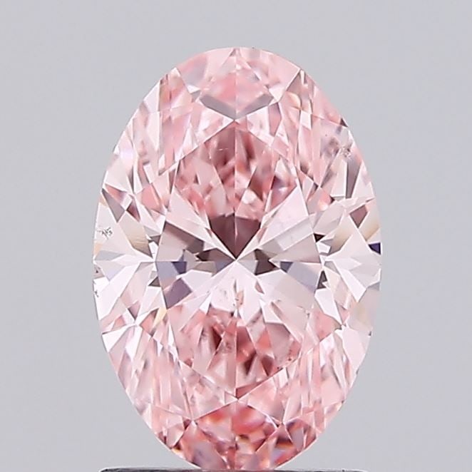 Loose Diamond - OVAL 1.56ct Fancy Vivid Pink VS2: Loose Diamond - OVAL 1.56ct Fancy Vivid Pink VS2 Source: This is a real non-mined Diamond that has been grown in a lab Shape: OVAL Carats: 1.56 Color: Fancy Vivid Pink Certification: IGI Video: