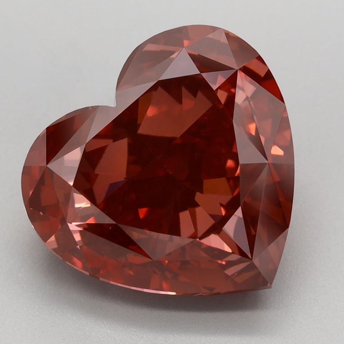 Loose Diamond - HEART 5.41ct Fancy Vivid Brownish Pink VVS2: Loose Diamond - HEART 5.41ct Fancy Vivid Brownish Pink VVS2 Source: This is a real non-mined Diamond that has been grown in a lab Shape: HEART Carats: 5.41 Color: Fancy Vivid Brownish Pink