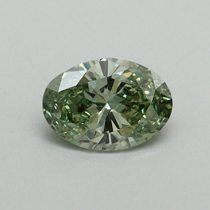 Loose Diamond - OVAL 0.35ct Fancy Vivid Green VS1: Loose Diamond - OVAL 0.35ct Fancy Vivid Green VS1 Source: This is a real non-mined Diamond that has been grown in a lab Shape: OVAL Carats: 0.35 Color: Fancy Vivid Green Certification: IGI Video: