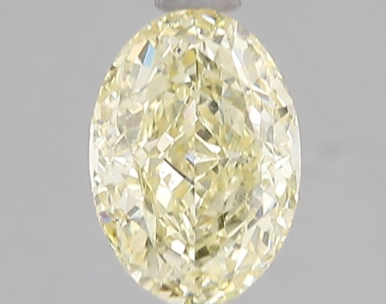 Loose Diamond - OVAL 1.58ct Fancy Yellow VS1: Loose Diamond - OVAL 1.58ct Fancy Yellow VS1 Source: This is a real non-mined Diamond that has been grown in a lab Shape: OVAL Carats: 1.58 Color: Fancy Yellow Certification: IGI Video: